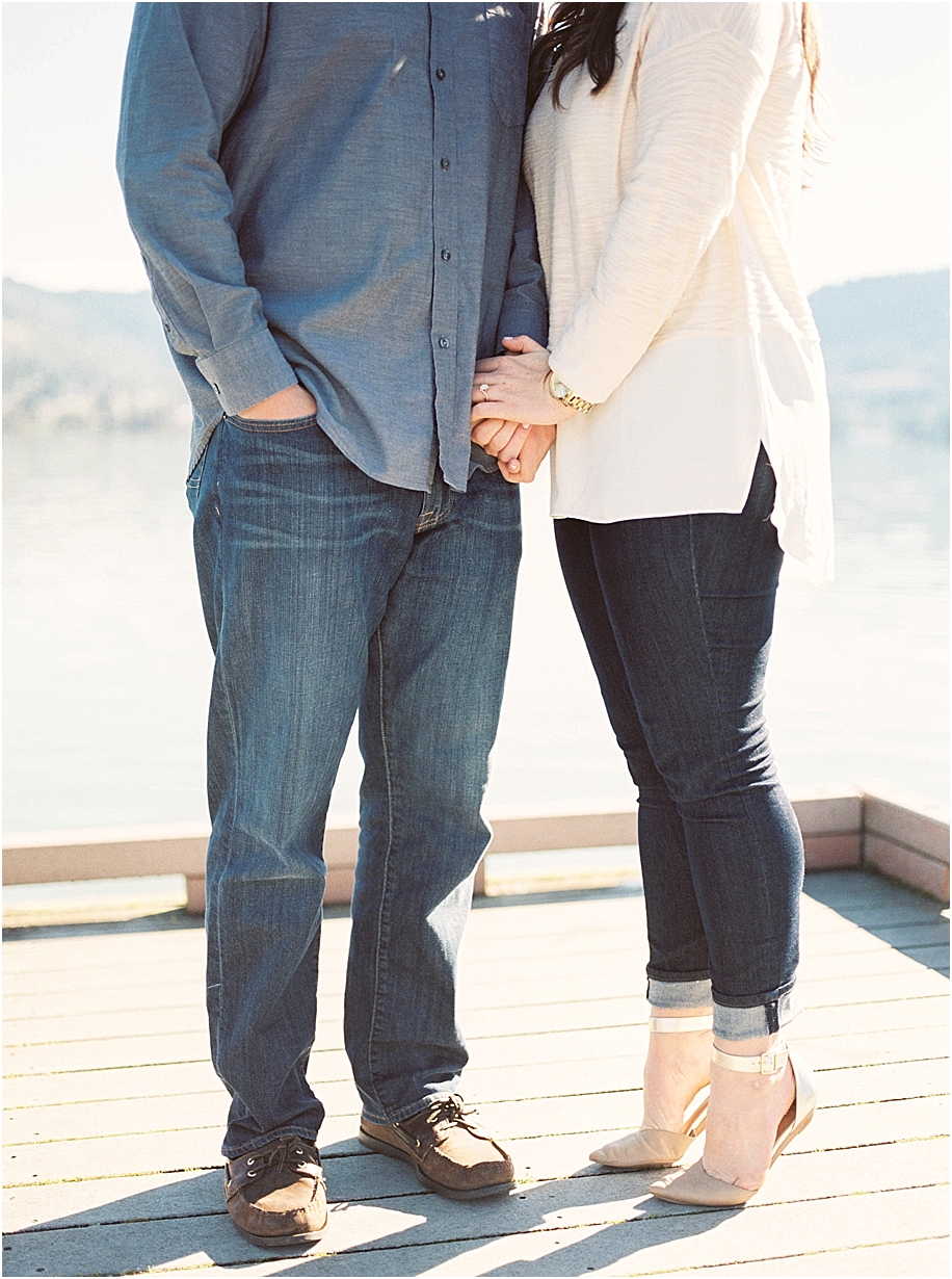 couple-holding-hands-on-dock-in-oregon-for-engagement-session