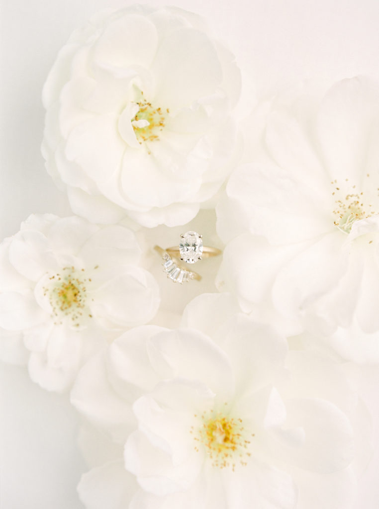 flowers-with-wedding-ring-AmandaKPhotography